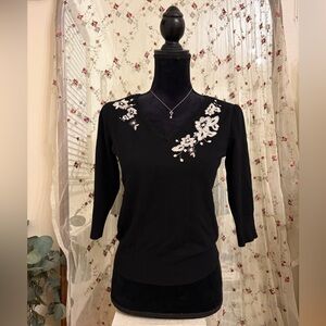 Roz & Ali Black V-Neck Sweater with White Floral Appliqué